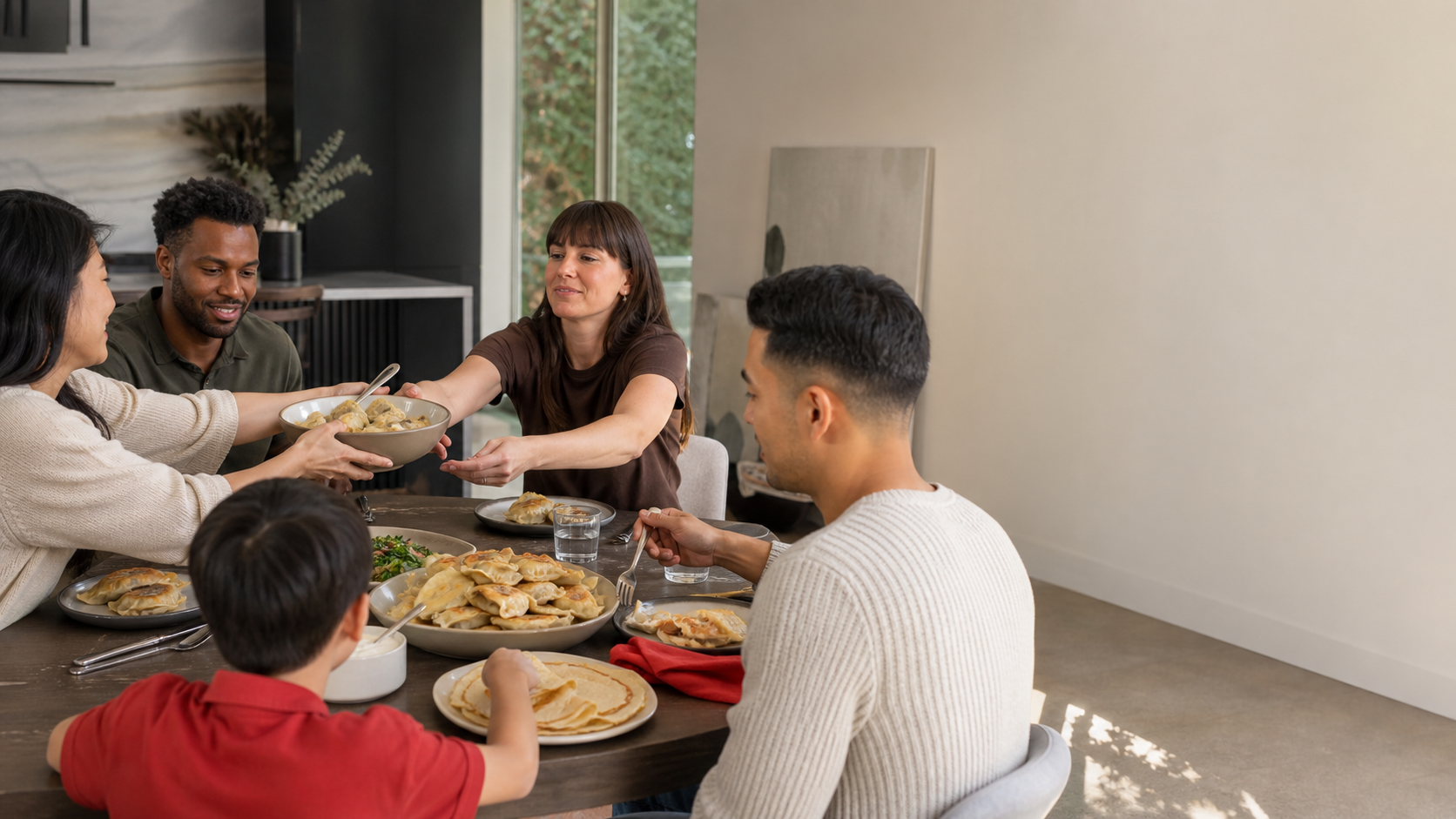 Family and friends sharing dumplings